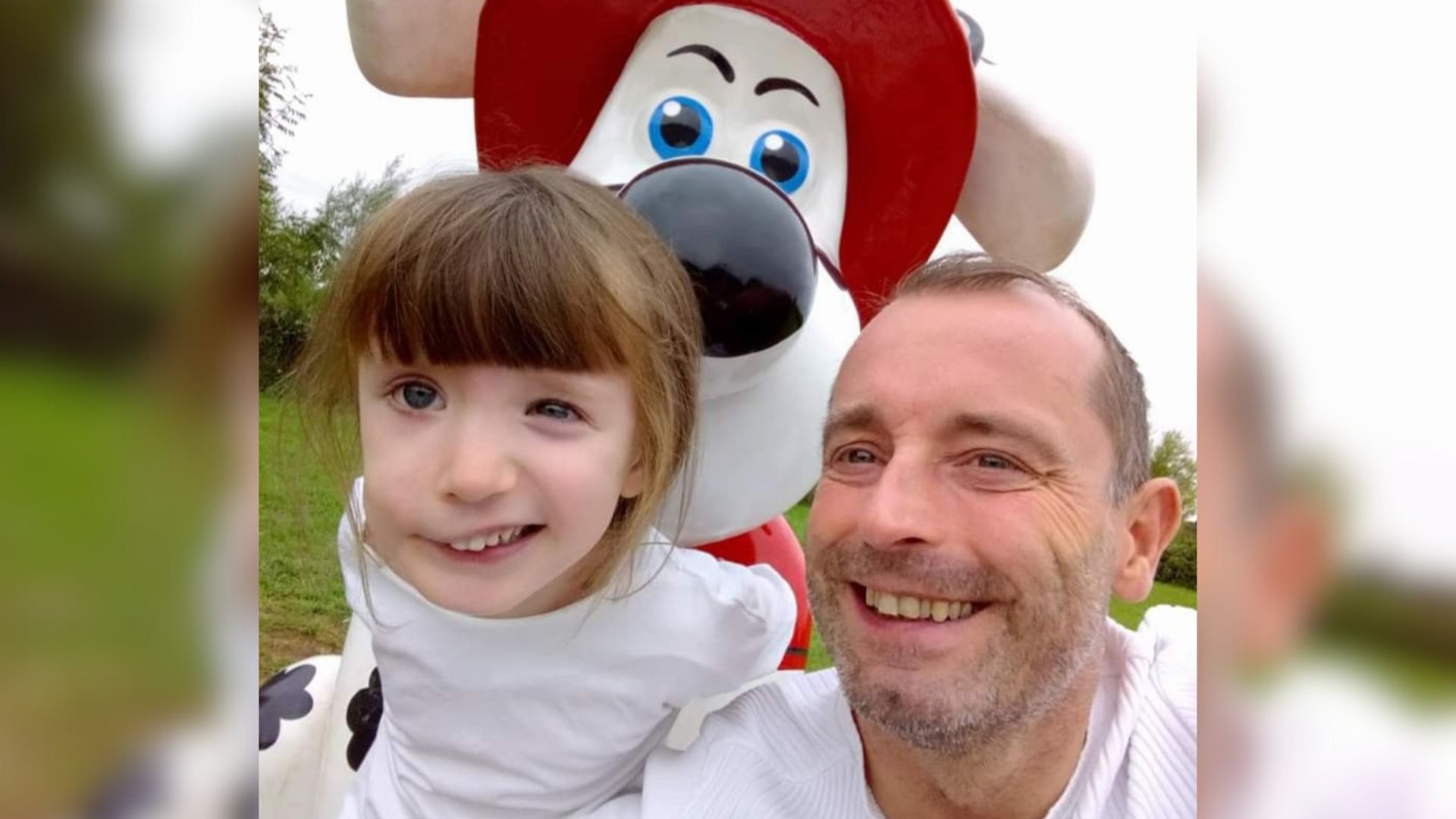 Millie, 6/, and dad, Carl smiling at camera.